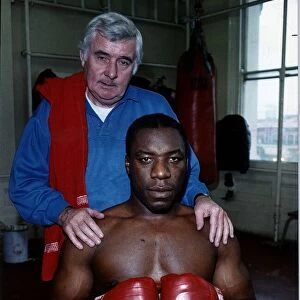 Gary Mason boxer with coach in a gym