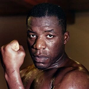 Gary Mason Boxing Heavywieght boxer flexing his arm muscles