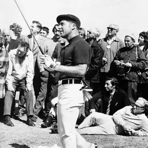Gary Player and spectators follow his shot during practice for the British Golf Open Gary Player and spectators follow his shot during practice for the British Golf Open
