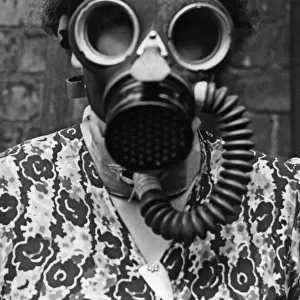 A gas mask for the use of people who breathe through a tracheal tube in the throat has