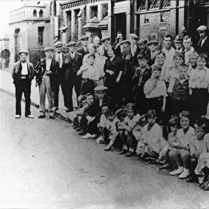 A gathering outside of The Plume of Feathers pub in Miles Street, Small Heath, Birmingham