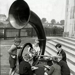 Gathering of young lads with a giant antiquated gramphone. 11th July 1944