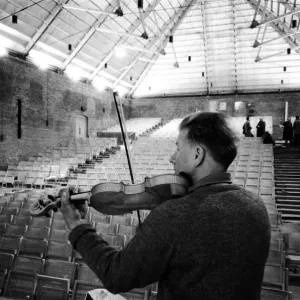 £13 a week carpenter Len Edmunds playing his homemade violin £13 a week carpenter Len Edmunds playing his homemade violin