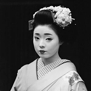 Geisha girl, Katsuno, pictured outside her Geisha House in Kyoto, Japan, 8th March 1982