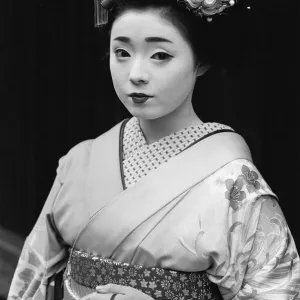 Geisha girl, Katsuno, pictured outside her Geisha House in Kyoto, Japan, 8th March 1982 Geisha girl, Katsuno, pictured outside her Geisha House in Kyoto, Japan, 8th March 1982