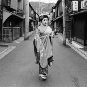 Geisha girl, Katsuno, pictured outside her Geisha House in Kyoto, Japan, 8th March 1982 Geisha girl, Katsuno, pictured outside her Geisha House in Kyoto, Japan, 8th March 1982