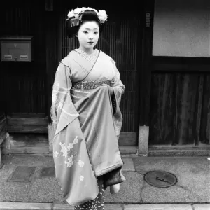 Geisha girl, Katsuno, pictured outside her Geisha House in Kyoto, Japan, 8th March 1982 Geisha girl, Katsuno, pictured outside her Geisha House in Kyoto, Japan, 8th March 1982