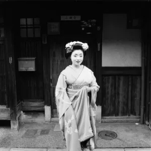 Geisha girl, Katsuno, pictured outside her Geisha House in Kyoto, Japan, 8th March 1982 Geisha girl, Katsuno, pictured outside her Geisha House in Kyoto, Japan, 8th March 1982