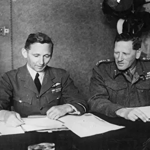 General Auchinleck and Air Marshall Tedder at a war council at GHQ in Cairo
