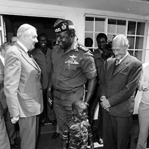 General Idi Amin introduces his son to Foreign Secetary James Callaghan
