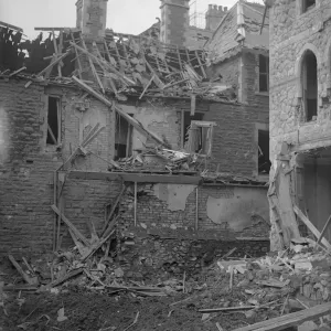 General scene showing destruction to residential housing following an air raid
