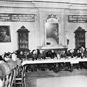 General view of banquet hall, decorated by banners and pictures of Stalin and Roosevelt