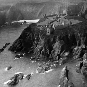 General view of the ruined medieval fortress of Dunnottar Castle near Stonehaven General view of the ruined medieval fortress of Dunnottar Castle near Stonehaven