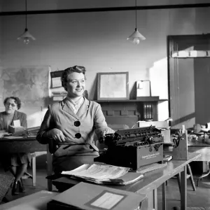 General views of office life and secretaries. A2a