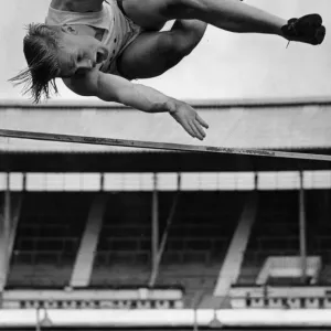 Geoff Elliot seen here competing and winning the high jump at the universities athletic