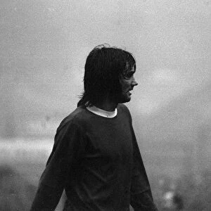 George Best appears out of the mist in the Huddersfield v Manchester United game on a