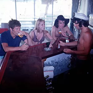 George Best Football serves drinks up to Susan George Actress