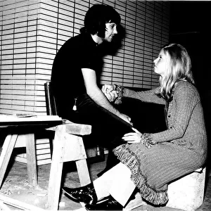 George Best and girlfriend Siv Hederby hold hands August 1970 at his new home under