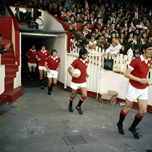 George Best of Manchester United walks onto the pitch at Old Trafford before their