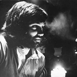 George Best the night club owner relaxing in the smokey atmosphere of his club May