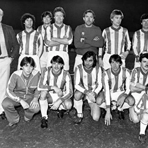 George Best poses with the rest of the team before the match begins. 7th March 1983
