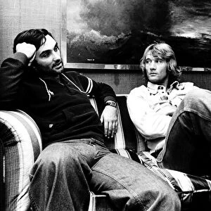 George Best and Rodney Marsh together on sofa circa 1976 who are both playing together