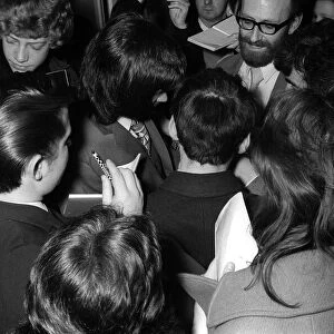 George Best signs autographs for fans April 1971