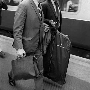 George Best and Sir Matt Busby on railway platform 1971 after George had been sent