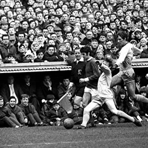 George Best on the wing for Manchester United challenged by three defenders during