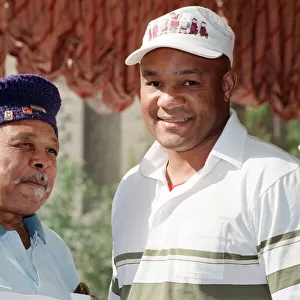 George Foreman pictured with Archie Moore. Tomorrow Foreman is fighting Terry Anderson at