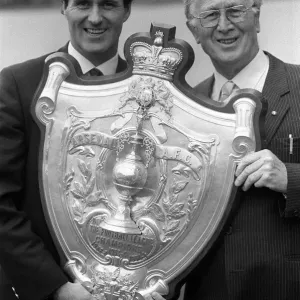 George Graham and Joe Mercer hold the Championship shield at Highbury