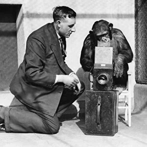George Greenwell Daily Mirror photographer seen here in the monkey house at London Zoo