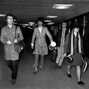 George Harrison of the Beatles at Heathrow airport where he arrived from India where he