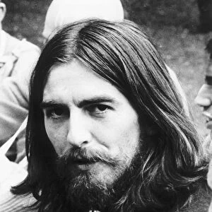 George Harrison of The Beatles pictured at Krishna Temple meeting in London