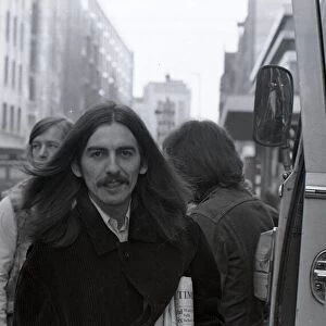 George Harrison in Birmingham City Centre before performing at the Town Hall
