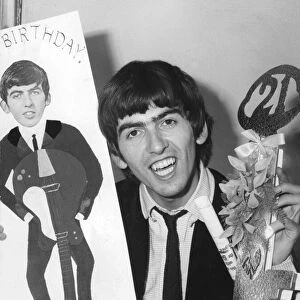 George Harrison celebrates his 21st birthday. The first greeting came from George