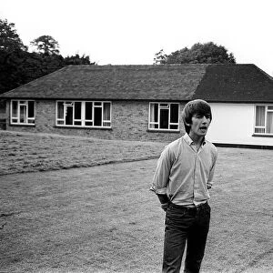 George Harrison at his Esher bungalow in Surrey. July 1964