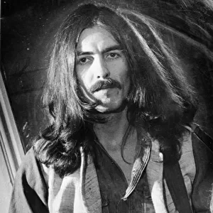 George Harrison pictured backstage at The Empire Theatre in Liverpool in December 1969
