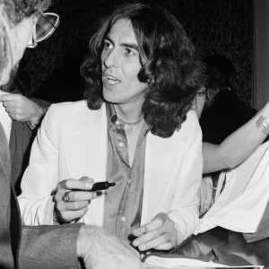 George Harrison signs Thirty Three and 1/3 album poster print