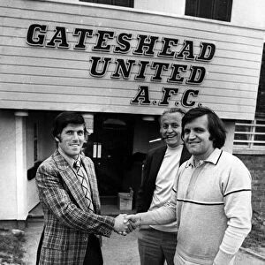 George Herd bids goodbye to Gateshead United with a friendly handshake from fellow coach