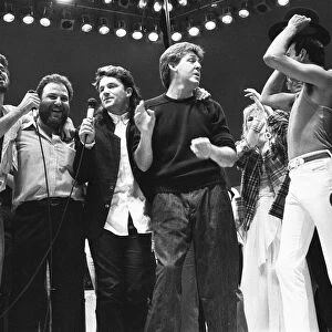 George Michael, Harvey Goldsmith, Bono, Paul McCartney and Freddie Mercury