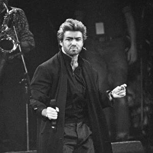 George Michael performing at the Stand by Me: AIDS Day Benefit concert at Wembley Arena