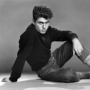 George Michael of the teenage duo Wham!, poses in the studio. 30th October 1982
