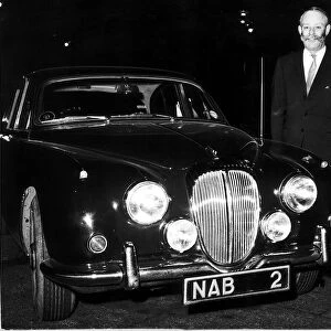 Gerald Nabarro MP with his jaguar car with his own number plate