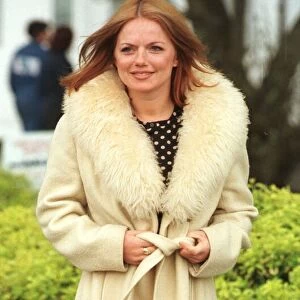 Geri Halliwell Ginger Spice April 1998 wearing long coat with fur collar prepares