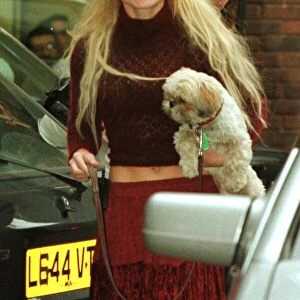 Geri Halliwell November 1999 with her dog Harry Leaving Unique Broadcasting studios