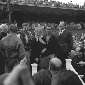 German driver Wolfgang Von Trips on the podium with Mrs Ferrari