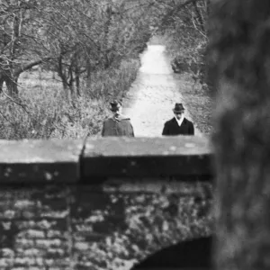 Former German Kaiser, Wilhelm Hohenzollern, walks in the garden of a small estate in