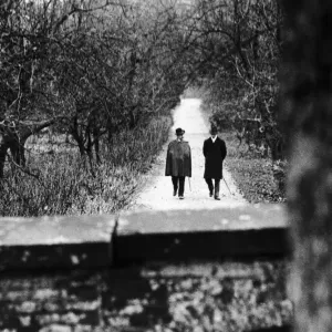Former German Kaiser, Wilhelm Hohenzollern, walks in the garden of a small estate in Former German Kaiser, Wilhelm Hohenzollern, walks in the garden of a small estate in