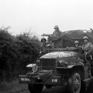 German Soldiers captured in Cherbourg are escorted to camp by allied forces June 30th